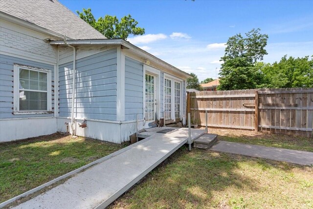 413 Houghton Ave, Marlin, TX 76661 - view of home's exterior featuring french doors