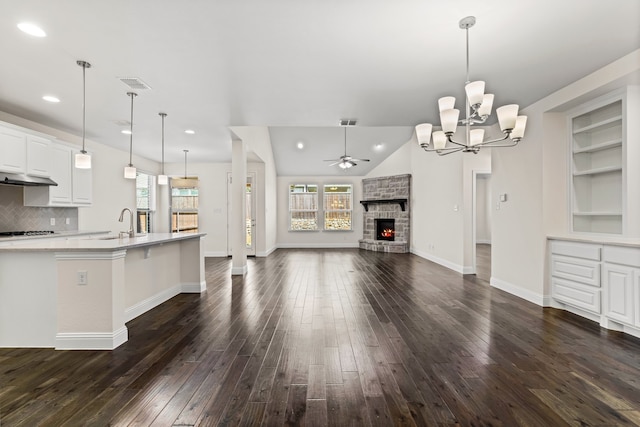 1514 Carnation St, Celina, TX 75078 - kitchen with dark wood finished floors, recessed lighting, light countertops, open floor plan, and ceiling fan