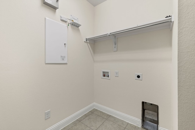 1514 Carnation St, Celina, TX 75078 - washroom featuring light tile patterned floors, washer hookup, hookup for an electric dryer, and baseboards