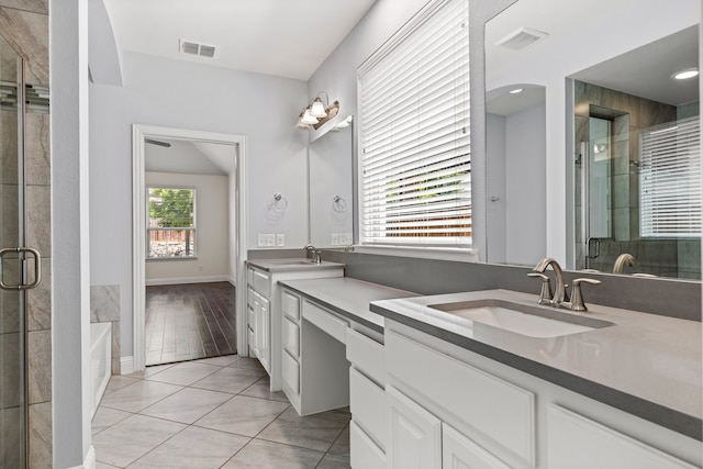 1514 Carnation St, Celina, TX 75078 - bathroom featuring a shower stall, double vanity, tile patterned flooring, and baseboards