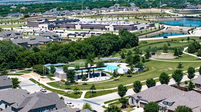 1514 Carnation St, Celina, TX 75078 - aerial view of residential area with a pool area and a large body of water