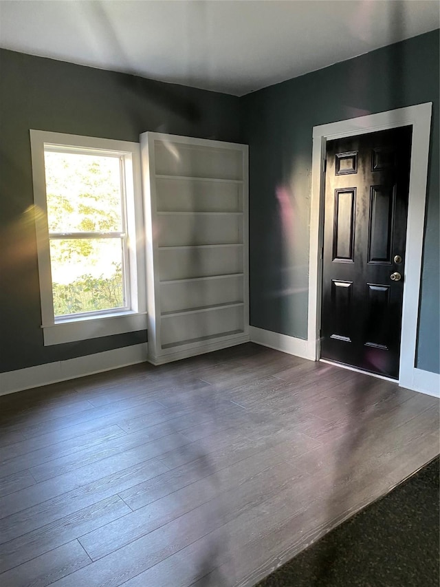 4122 Carver St, Shreveport, LA 71109 - foyer with baseboards and dark wood-type flooring