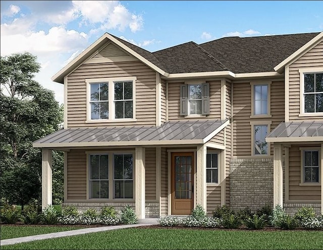 1406 Fennel, Argyle, TX 76226 - view of front facade with a standing seam roof, metal roof, roof with shingles, and brick siding