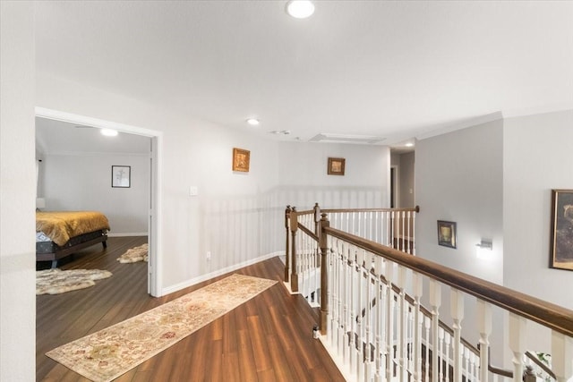 406 Doyle Dr, Keller, TX 76248 - corridor featuring wood finished floors, recessed lighting, attic access, baseboards, and an upstairs landing