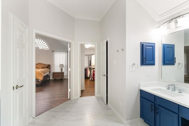 406 Doyle Dr, Keller, TX 76248 - bathroom with marble finish flooring, crown molding, vanity, and baseboards