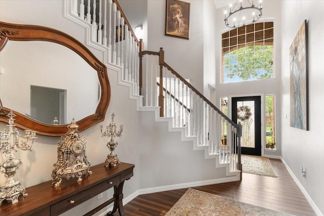 406 Doyle Dr, Keller, TX 76248 - entryway featuring a towering ceiling, healthy amount of natural light, wood finished floors, and stairs