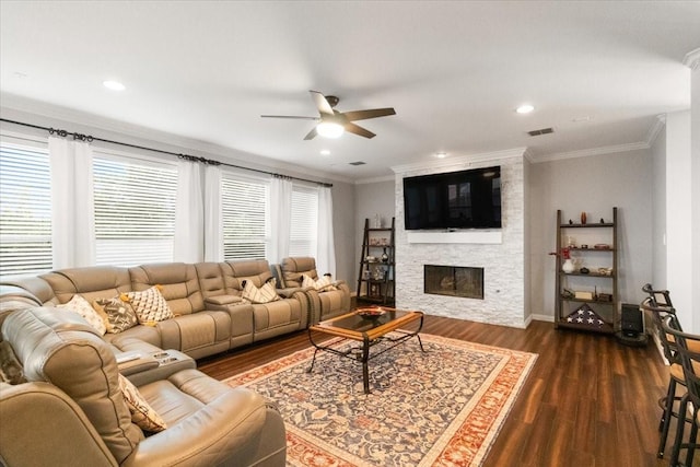 406 Doyle Dr, Keller, TX 76248 - living room with a ceiling fan, dark wood finished floors, crown molding, a fireplace, and recessed lighting