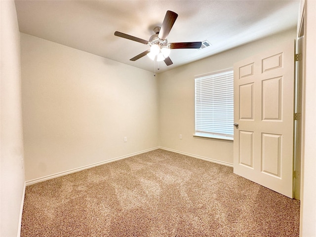 2422 Langston St, Fort Worth, TX 76105 - empty room featuring carpet flooring, a ceiling fan, and baseboards