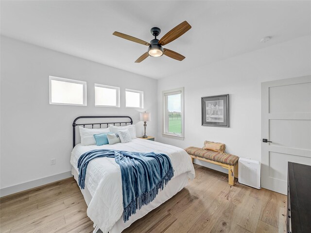 6362 Belz Rd, Sanger, TX 76266 - bedroom with light wood-style floors and ceiling fan