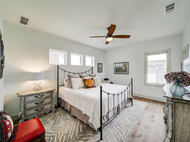 6362 Belz Rd, Sanger, TX 76266 - bedroom with light wood-style flooring, ceiling fan, and baseboards
