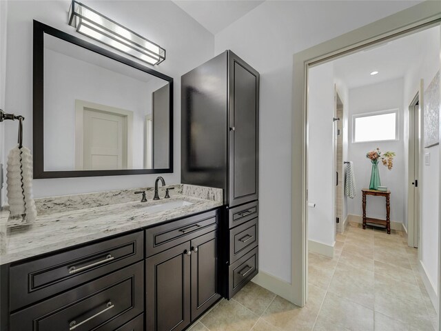 6362 Belz Rd, Sanger, TX 76266 - full bathroom with vanity, a shower stall, baseboards, and tile patterned floors