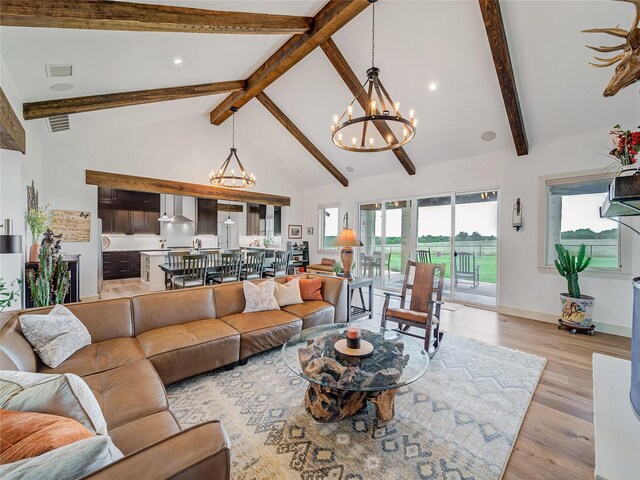6362 Belz Rd, Sanger, TX 76266 - living area featuring a chandelier, beamed ceiling, high vaulted ceiling, light wood-style flooring, and recessed lighting