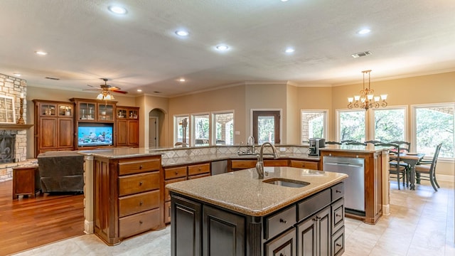 1851 Rock Church Hwy, Tolar, TX 76476 - kitchen featuring a large island, stainless steel dishwasher, a sink, arched walkways, and recessed lighting