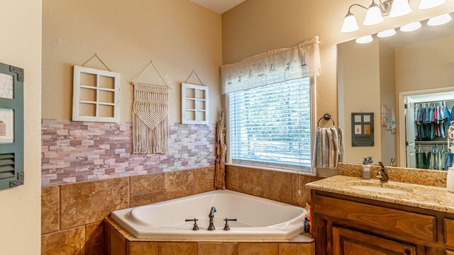 1851 Rock Church Hwy, Tolar, TX 76476 - full bathroom with a bath, vanity, and a walk in closet