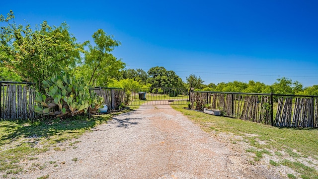 1851 Rock Church Hwy, Tolar, TX 76476 - view of road with a gate and a gated entry