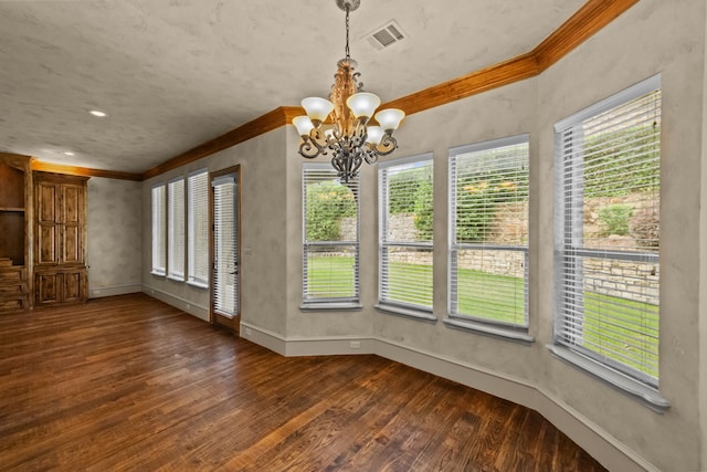 608 Guadalupe Rd, Keller, TX 76248 - unfurnished dining area with ornamental molding, dark wood-type flooring, a chandelier, and baseboards
