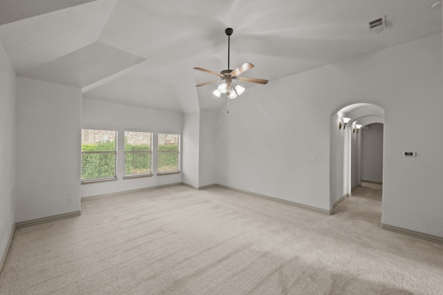 608 Guadalupe Rd, Keller, TX 76248 - empty room featuring light colored carpet, arched walkways, ceiling fan, baseboards, and lofted ceiling