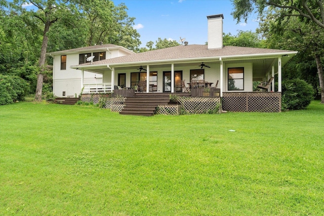 7016 Fm 3054, Malakoff, TX 75148 - view of front of home with ceiling fan, a front lawn, a chimney, and a porch