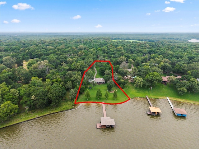 7016 Fm 3054, Malakoff, TX 75148 - aerial view of property's location featuring property boundaries highlighted, a heavily wooded area, and a large body of water