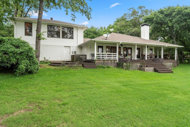 7016 Fm 3054, Malakoff, TX 75148 - back of house featuring ceiling fan, a chimney, a lawn, and a deck