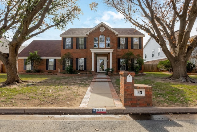 40 Pebble Beach St, Abilene, TX 79606 - colonial inspired home with roof with shingles and brick siding