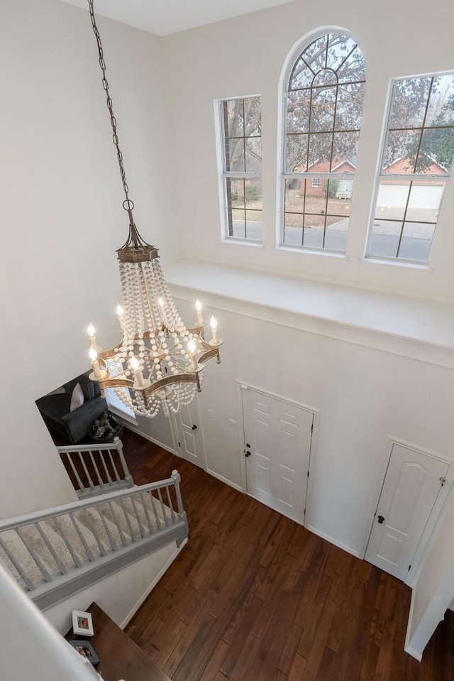 40 Pebble Beach St, Abilene, TX 79606 - entryway with wood finished floors, healthy amount of natural light, a chandelier, and a towering ceiling