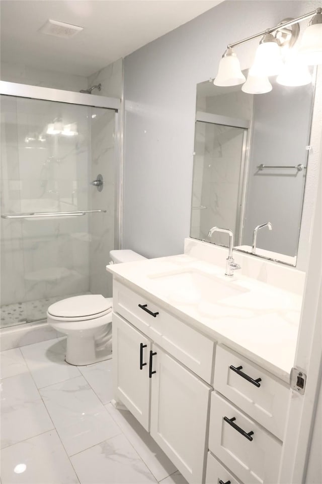 494 Lannius Rd, Dodd City, TX 75438 - bathroom with a marble finish shower, vanity, toilet, and marble finish floors