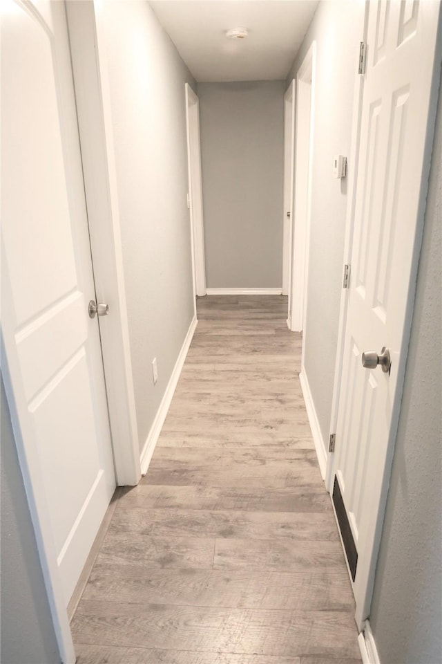 494 Lannius Rd, Dodd City, TX 75438 - corridor featuring light wood-style flooring and baseboards