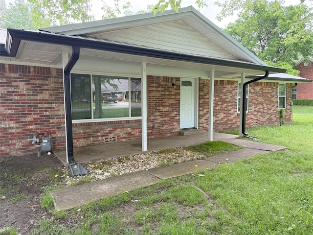 494 Lannius Rd, Dodd City, TX 75438 - view of front of property featuring brick siding, a front lawn, and a porch