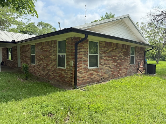 494 Lannius Rd, Dodd City, TX 75438 - view of property exterior featuring central AC unit, a yard, brick siding, and crawl space