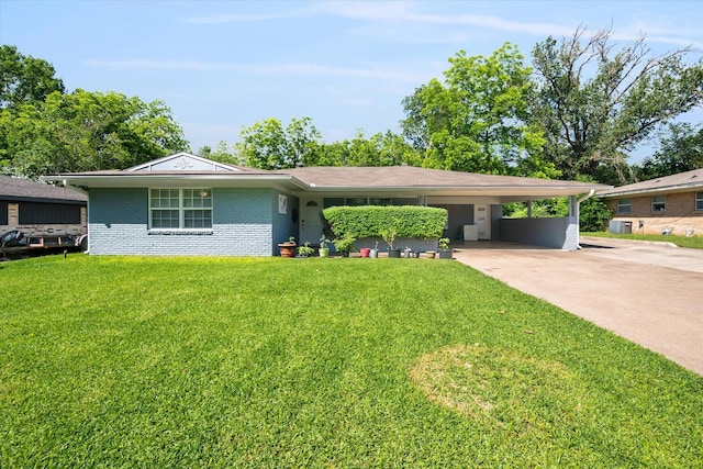 512 N 38th St, Corsicana, TX 75110 - ranch-style house featuring concrete driveway, a front lawn, a carport, and brick siding