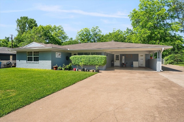 512 N 38th St, Corsicana, TX 75110 - ranch-style home featuring concrete driveway, a front yard, brick siding, and a carport