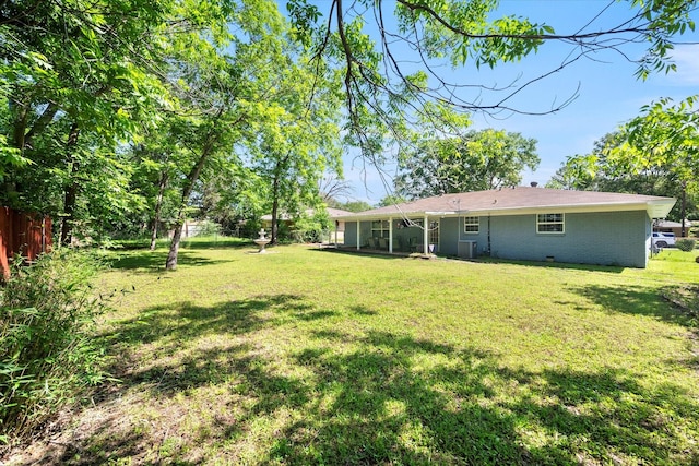 512 N 38th St, Corsicana, TX 75110 - view of yard featuring central air condition unit