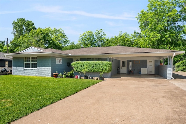 512 N 38th St, Corsicana, TX 75110 - ranch-style house featuring concrete driveway, a front lawn, a carport, and brick siding