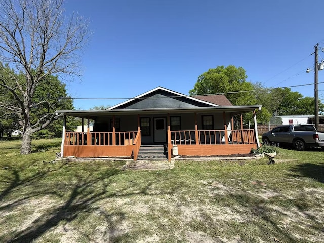 112 Plainview Dr, Wylie, TX 75098 - farmhouse with covered porch and a front lawn