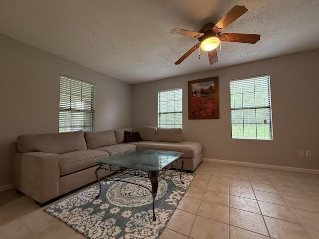 112 Plainview Dr, Wylie, TX 75098 - living room with plenty of natural light, ceiling fan, a textured ceiling, and baseboards