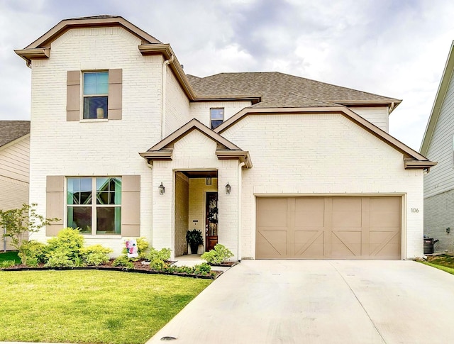 106 Observation Dr W, Aledo, TX 76008 - traditional home featuring brick siding, concrete driveway, a garage, a front lawn, and roof with shingles
