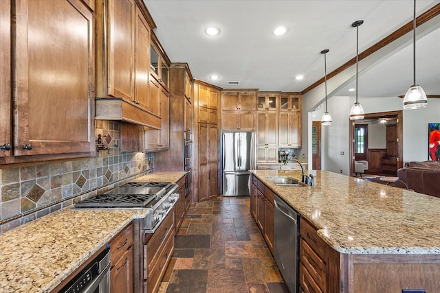2035 Hodges Lake Dr, Rockwall, TX 75032 - kitchen featuring appliances with stainless steel finishes, a sink, stone tile floors, brown cabinetry, and glass insert cabinets