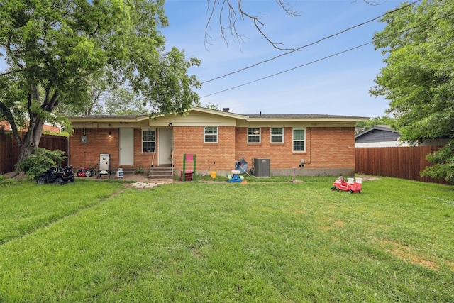 3508 Valencia Ct, Fort Worth, TX 76116 - rear view of property featuring brick siding and central AC unit