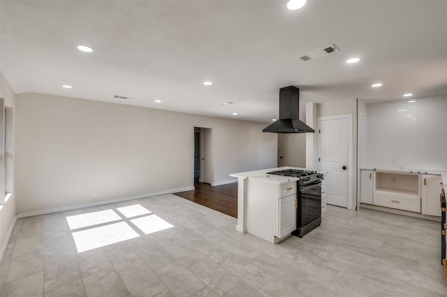 2622 Wynnewood Dr, Dallas, TX 75224 - kitchen with black range with gas cooktop, exhaust hood, recessed lighting, open floor plan, and baseboards
