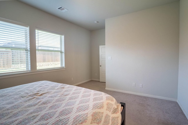 4714 Crestwood Dr, Haltom City, TX 76137 - bedroom with light carpet and baseboards