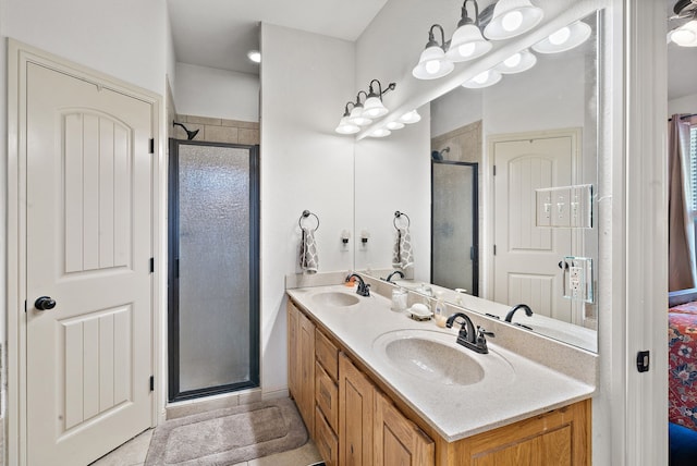 169 Savannah Dr, Brock, TX 76087 - bathroom featuring a stall shower, double vanity, and tile patterned floors