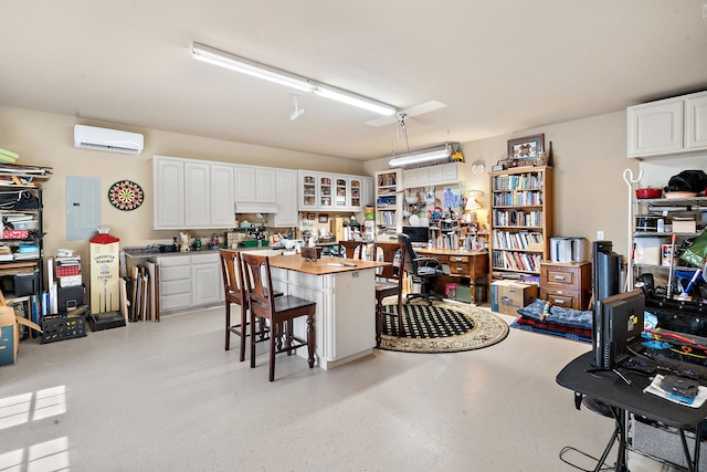 169 Savannah Dr, Brock, TX 76087 - office area featuring a wall mounted air conditioner and electric panel
