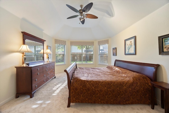 676 Woodland Way, Rockwall, TX 75087 - bedroom with light colored carpet, a ceiling fan, baseboards, and a tray ceiling