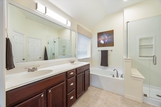 676 Woodland Way, Rockwall, TX 75087 - full bath featuring vaulted ceiling, a stall shower, double vanity, and a garden tub