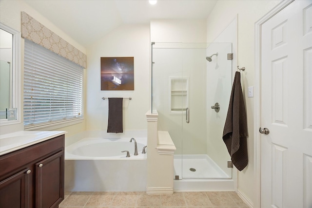 676 Woodland Way, Rockwall, TX 75087 - bathroom with a shower stall, a garden tub, vanity, and vaulted ceiling