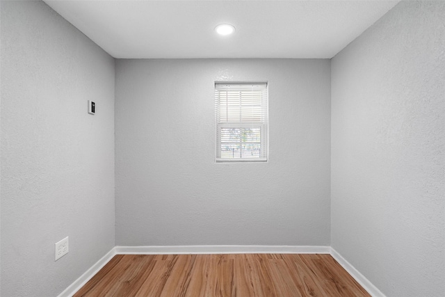 2511 S 7th, Waco, TX 76706 - unfurnished room with wood finished floors, baseboards, and recessed lighting