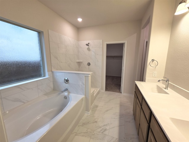 7749 Gatevine Ave, Joshua, TX 76058 - full bath featuring marble finish floors, tiled shower, a bath, a walk in closet, and double vanity