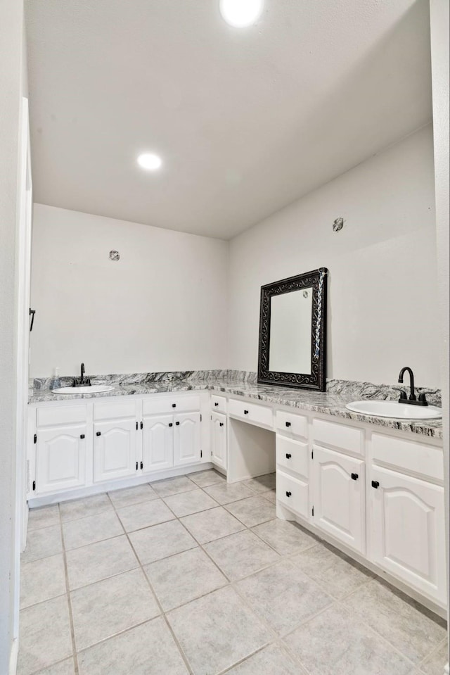 3966 Farm Road 196 N, Paris, TX 75462 - bathroom with double vanity and tile patterned flooring