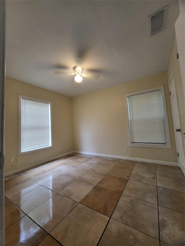 1906 N 4th St, Killeen, TX 76541 - tiled empty room with baseboards and ceiling fan